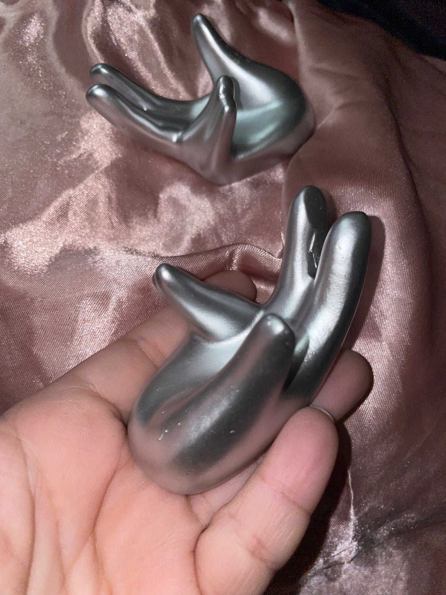 Hand shaped sphere stands