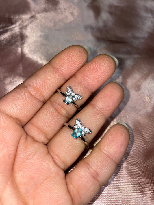Blue topaz firefly ring