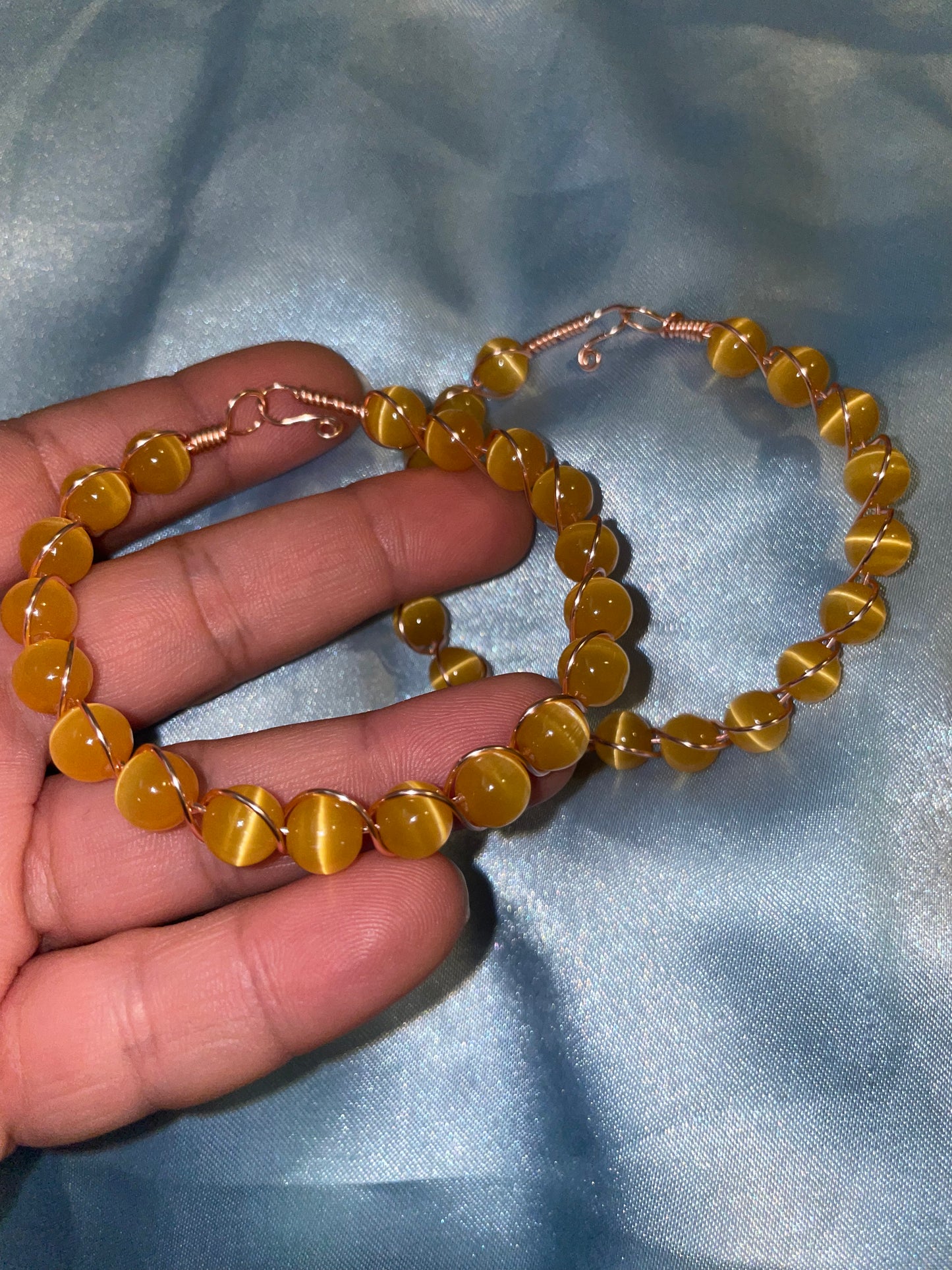 Wire wrapped cat’s eye bracelets