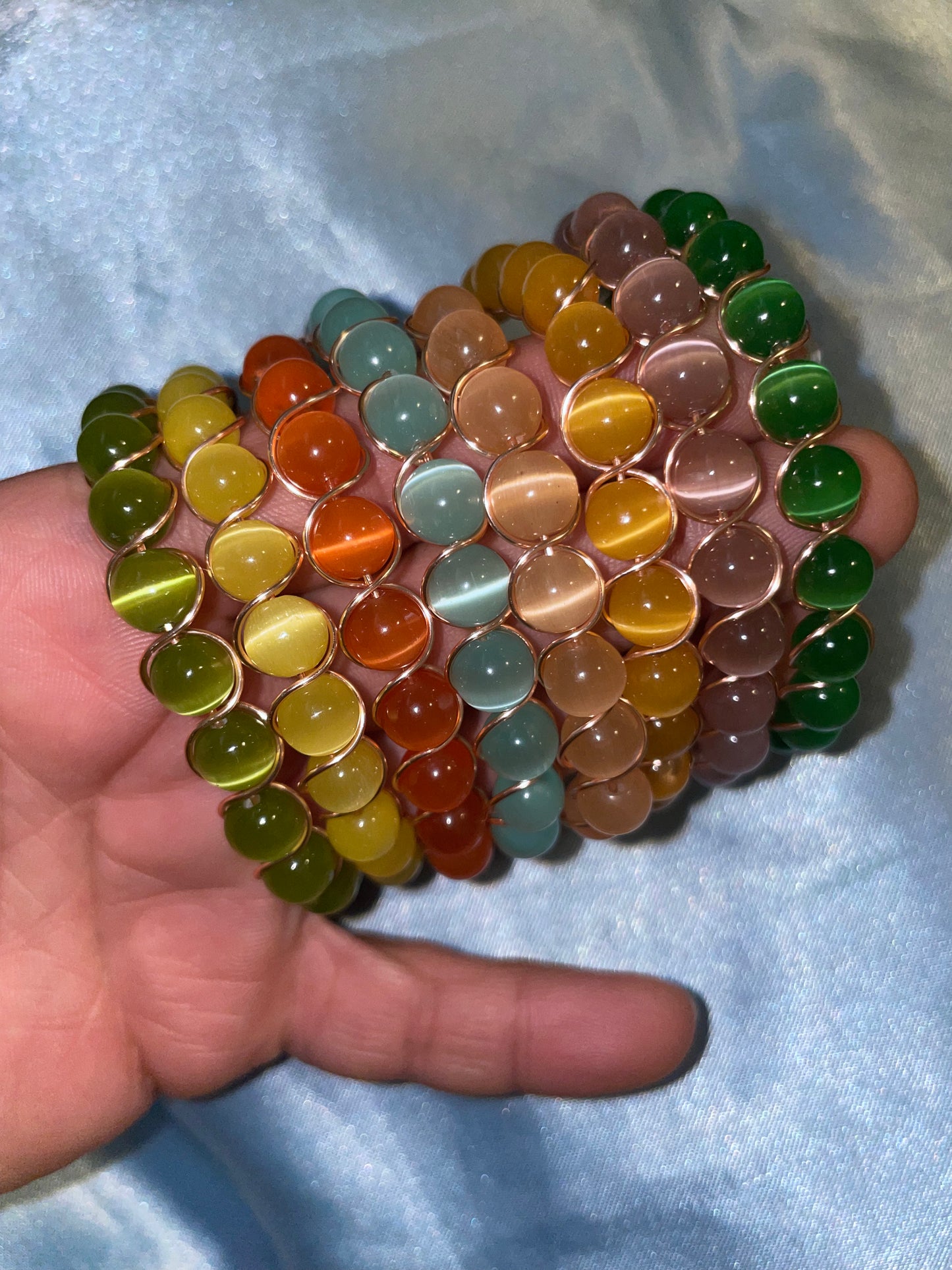 Wire wrapped cat’s eye bracelets