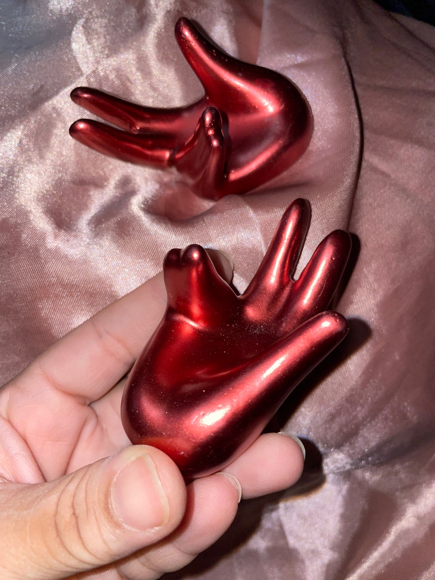 Hand shaped sphere stands