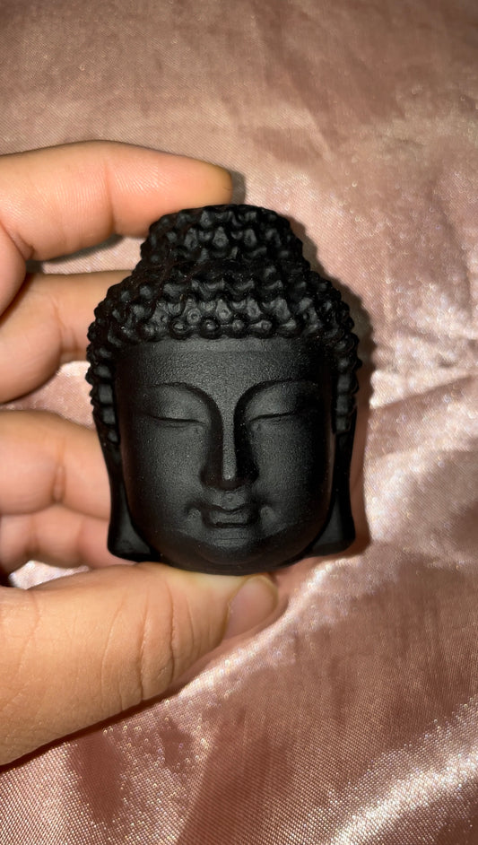 Black obsidian Buddha head