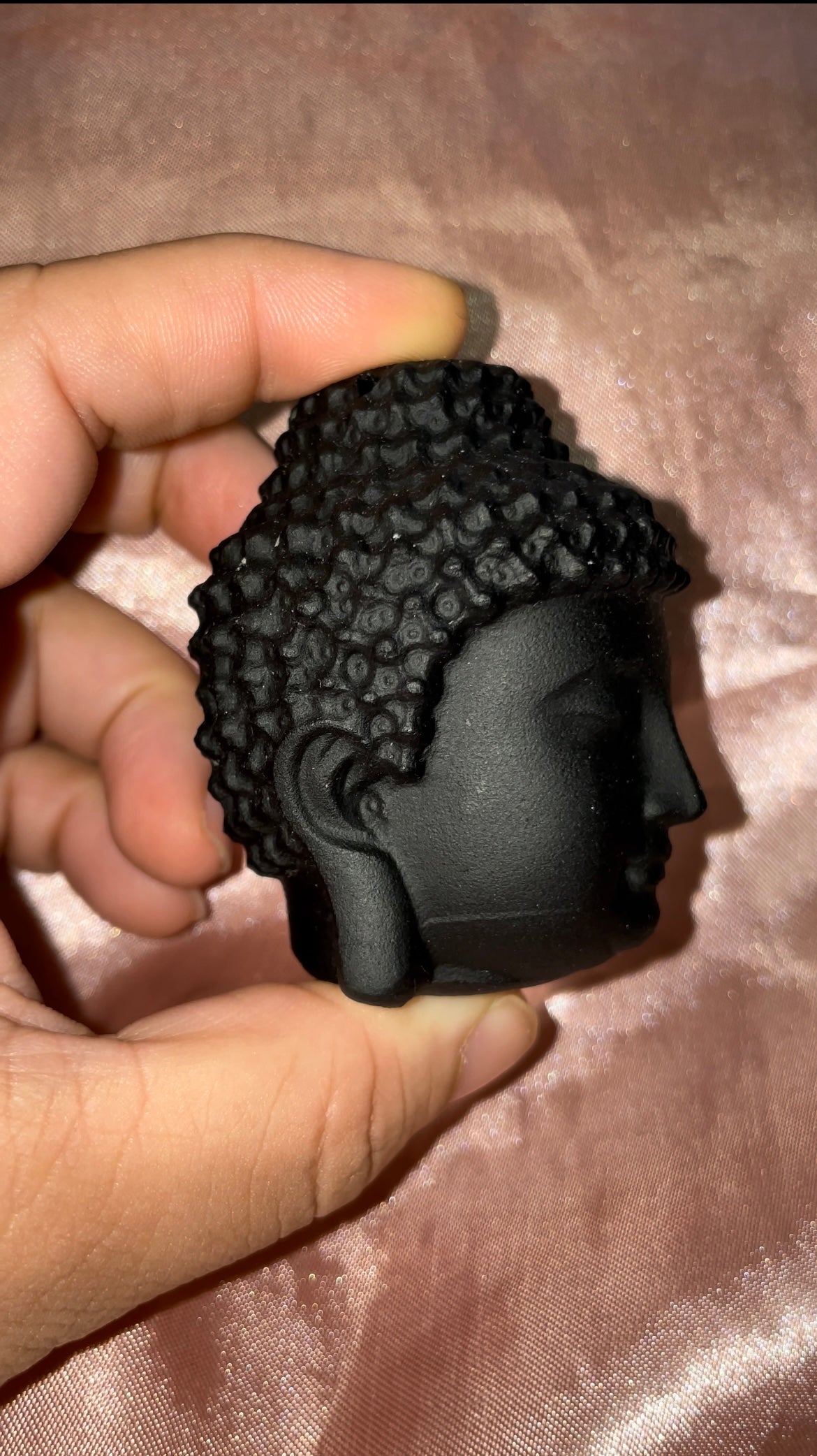Black obsidian Buddha head
