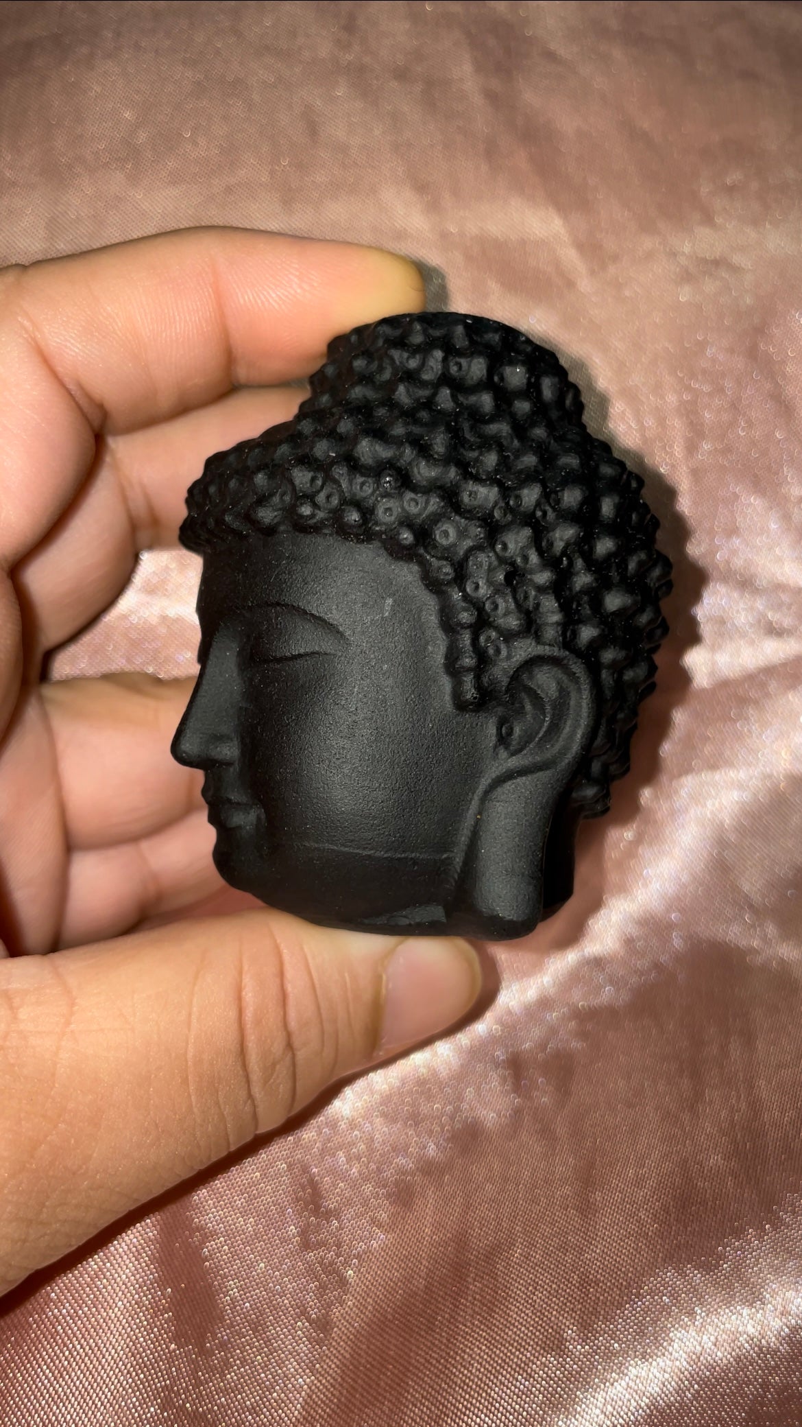 Black obsidian Buddha head